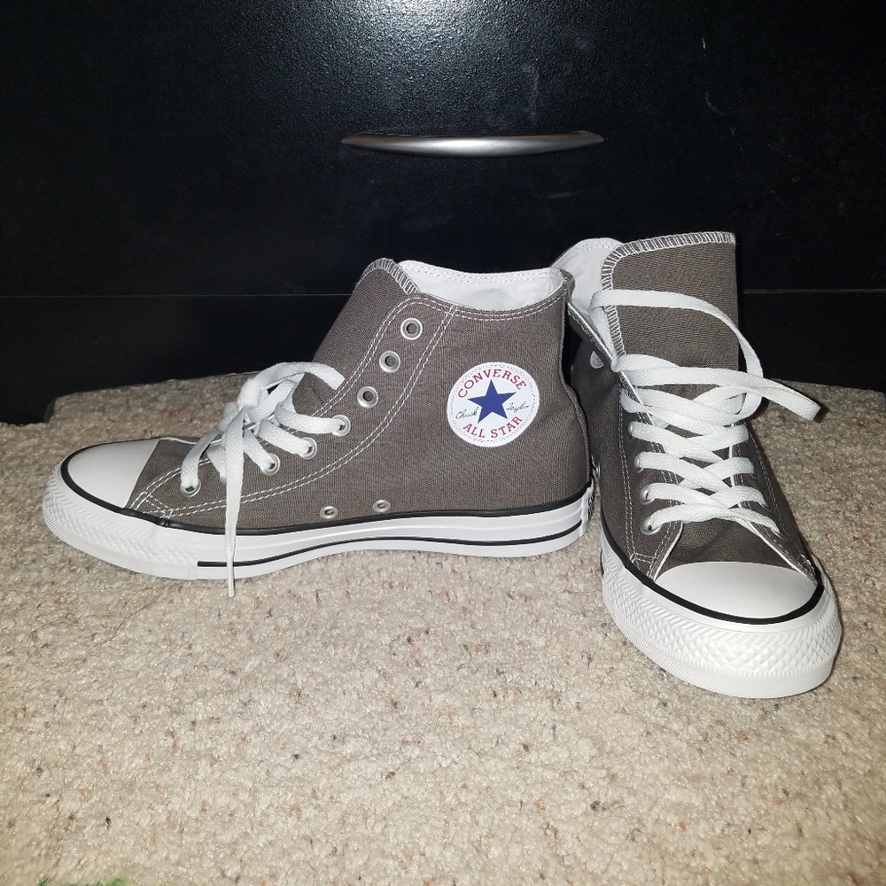 Unworn size 9.5 grey high top converse